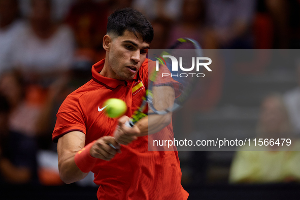 Carlos Alcaraz of Spain is in action during the game against Tomas Machac of Czechia during the 2024 Davis Cup Group B Stage match between C...