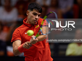 Carlos Alcaraz of Spain is in action during the game against Tomas Machac of Czechia during the 2024 Davis Cup Group B Stage match between C...