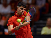 Carlos Alcaraz of Spain is in action during the game against Tomas Machac of Czechia during the 2024 Davis Cup Group B Stage match between C...