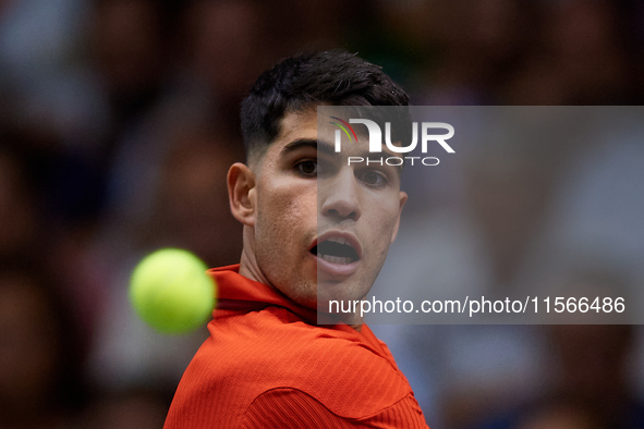 Carlos Alcaraz of Spain is in action during the game against Tomas Machac of Czechia during the 2024 Davis Cup Group B Stage match between C...