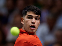 Carlos Alcaraz of Spain is in action during the game against Tomas Machac of Czechia during the 2024 Davis Cup Group B Stage match between C...