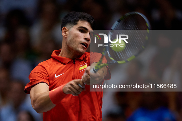 Carlos Alcaraz of Spain is in action during the game against Tomas Machac of Czechia during the 2024 Davis Cup Group B Stage match between C...