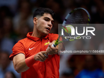 Carlos Alcaraz of Spain is in action during the game against Tomas Machac of Czechia during the 2024 Davis Cup Group B Stage match between C...