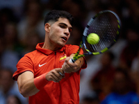 Carlos Alcaraz of Spain is in action during the game against Tomas Machac of Czechia during the 2024 Davis Cup Group B Stage match between C...