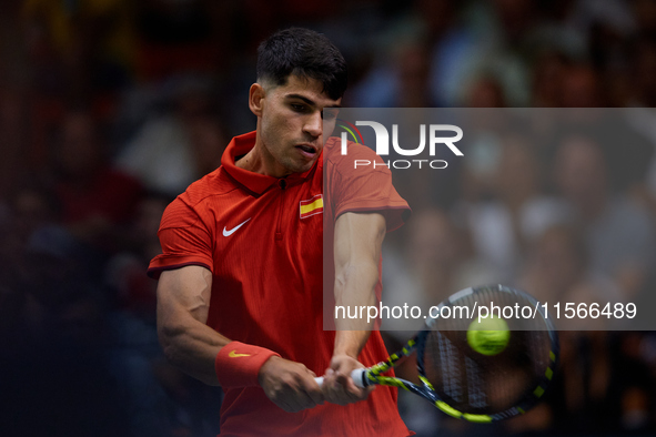 Carlos Alcaraz of Spain is in action during the game against Tomas Machac of Czechia during the 2024 Davis Cup Group B Stage match between C...