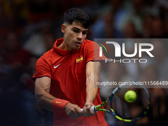 Carlos Alcaraz of Spain is in action during the game against Tomas Machac of Czechia during the 2024 Davis Cup Group B Stage match between C...