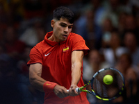 Carlos Alcaraz of Spain is in action during the game against Tomas Machac of Czechia during the 2024 Davis Cup Group B Stage match between C...