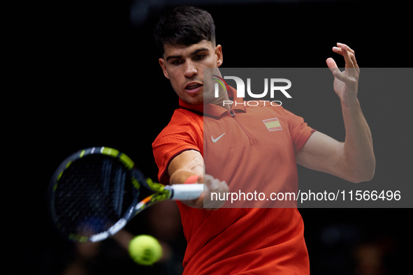 Carlos Alcaraz of Spain is in action during the game against Tomas Machac of Czechia during the 2024 Davis Cup Group B Stage match between C...