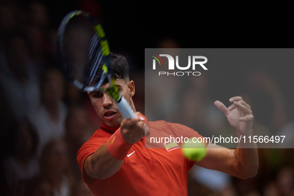 Carlos Alcaraz of Spain is in action during the game against Tomas Machac of Czechia during the 2024 Davis Cup Group B Stage match between C...