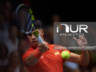 Carlos Alcaraz of Spain is in action during the game against Tomas Machac of Czechia during the 2024 Davis Cup Group B Stage match between C...