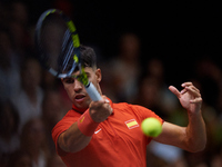 Carlos Alcaraz of Spain is in action during the game against Tomas Machac of Czechia during the 2024 Davis Cup Group B Stage match between C...