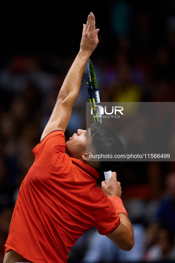 Carlos Alcaraz of Spain serves against Tomas Machac of Czechia during the 2024 Davis Cup Group B Stage match between Czechia and Spain at Pa...