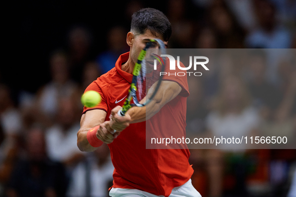 Carlos Alcaraz of Spain is in action during the game against Tomas Machac of Czechia during the 2024 Davis Cup Group B Stage match between C...