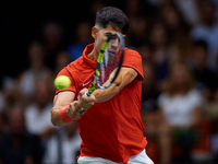 Carlos Alcaraz of Spain is in action during the game against Tomas Machac of Czechia during the 2024 Davis Cup Group B Stage match between C...