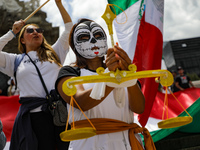 A woman participates in a protest at the Angel de la Independencia after the approval of the judicial reform to elect all judges by popular...