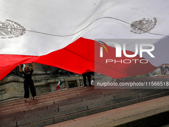 Judicial branch workers take part in a protest at the Angel de la Independencia after the approval of the judicial reform to elect all judge...