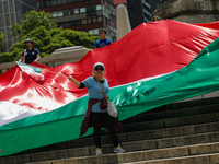 Judicial branch workers take part in a protest at the Angel de la Independencia after the approval of the judicial reform to elect all judge...