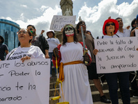 Judicial branch workers take part in a protest at the Angel de la Independencia after the approval of the judicial reform to elect all judge...