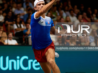 Tomas Machac of Czechia plays against Carlos Alcaraz of Spain during the 2024 Davis Cup Group B Stage match between Czechia and Spain at Pab...