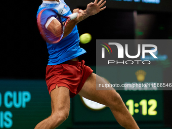 Tomas Machac of Czechia plays against Carlos Alcaraz of Spain during the 2024 Davis Cup Group B Stage match between Czechia and Spain at Pab...