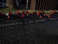 Flowers are left at the memorial of disappeared detainees in Valparaiso, Chile, on the 51st anniversary of the coup. (