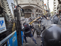 Protesters, including retirees and families, gather outside Argentina's National Congress following President Javier Milei's veto of the Mob...