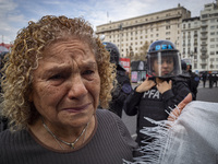 Protesters, including retirees and families, gather outside Argentina's National Congress following President Javier Milei's veto of the Mob...