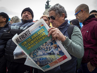 Protesters, including retirees and families, gather outside Argentina's National Congress following President Javier Milei's veto of the Mob...