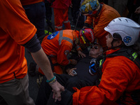 Protesters, including retirees and families, gather outside Argentina's National Congress following President Javier Milei's veto of the Mob...