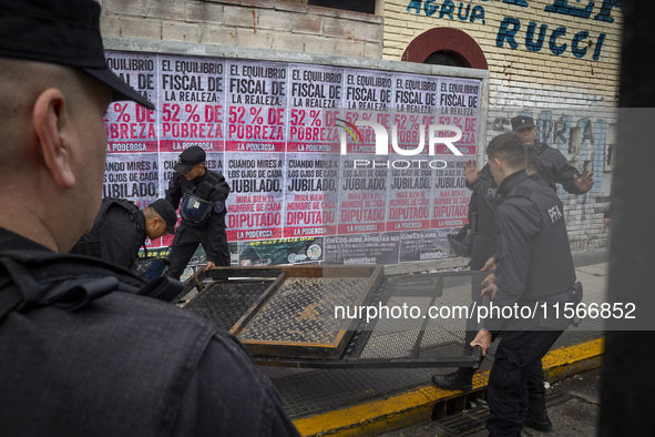 Protesters, including retirees and families, gather outside Argentina's National Congress following President Javier Milei's veto of the Mob...