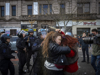 Protesters, including retirees and families, gather outside Argentina's National Congress following President Javier Milei's veto of the Mob...