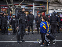 Protesters, including retirees and families, gather outside Argentina's National Congress following President Javier Milei's veto of the Mob...