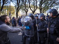 Protesters, including retirees and families, gather outside Argentina's National Congress following President Javier Milei's veto of the Mob...