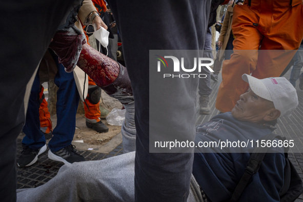 Protesters, including retirees and families, gather outside Argentina's National Congress following President Javier Milei's veto of the Mob...