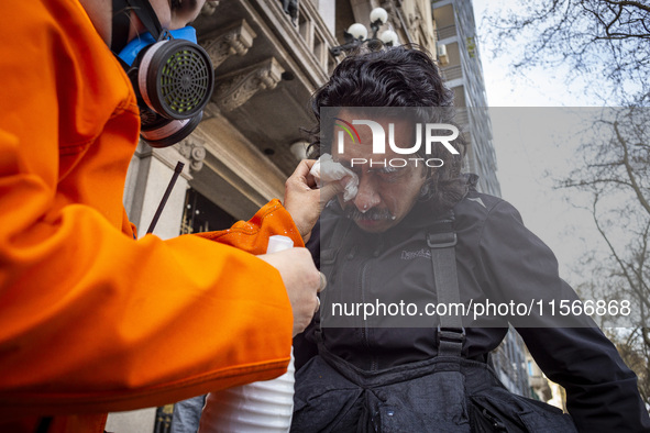 Protesters, including retirees and families, gather outside Argentina's National Congress following President Javier Milei's veto of the Mob...