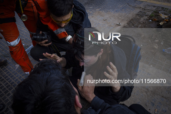 Protesters, including retirees and families, gather outside Argentina's National Congress following President Javier Milei's veto of the Mob...