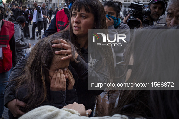 Protesters, including retirees and families, gather outside Argentina's National Congress following President Javier Milei's veto of the Mob...