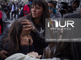 Protesters, including retirees and families, gather outside Argentina's National Congress following President Javier Milei's veto of the Mob...