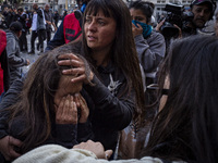 Protesters, including retirees and families, gather outside Argentina's National Congress following President Javier Milei's veto of the Mob...