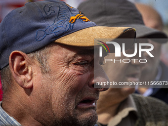 Protesters, including retirees and families, gather outside Argentina's National Congress following President Javier Milei's veto of the Mob...