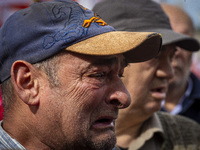 Protesters, including retirees and families, gather outside Argentina's National Congress following President Javier Milei's veto of the Mob...