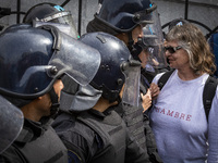 Protesters, including retirees and families, gather outside Argentina's National Congress following President Javier Milei's veto of the Mob...