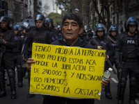 Protesters, including retirees and families, gather outside Argentina's National Congress following President Javier Milei's veto of the Mob...