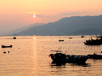 Workers work in a breeding area at a marine ranch in Dinghai Bay, Lianjiang County in Fuzhou, China, on September 10, 2024. (