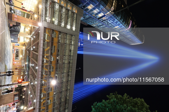 The Tribute in Light rises above the New York City skyline near the entrance of the Battery Tunnel in New York City, United States, on Septe...