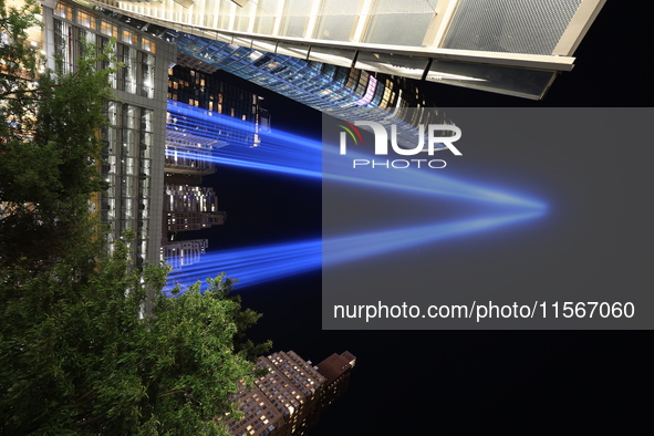 The Tribute in Light rises above the New York City skyline near the entrance of the Battery Tunnel in New York City, United States, on Septe...