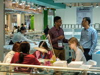 Visitors and exhibitors attend the 70th gems and jewelry fair in Bangkok, Thailand. The trade show is one of the most important events of it...