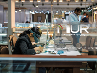 Visitors and exhibitors attend the 70th gems and jewelry fair in Bangkok, Thailand. The trade show is one of the most important events of it...