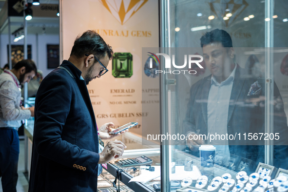 Visitors and exhibitors attend the 70th gems and jewelry fair in Bangkok, Thailand. The trade show is one of the most important events of it...