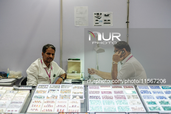 Visitors and exhibitors attend the 70th gems and jewelry fair in Bangkok, Thailand. The trade show is one of the most important events of it...